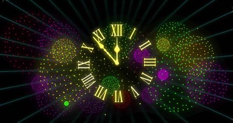 Midnight Clock with Vibrant Fireworks Celebration - Download Free Stock Images Pikwizard.com