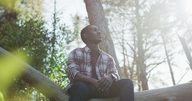 African American Man Enjoying Peaceful Moment Outdoors in the Forest - Download Free Stock Images Pikwizard.com