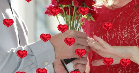 Romantic Valentine Proposal with Red Roses and Ring Exchange - Download Free Stock Images Pikwizard.com