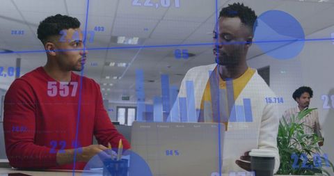 Colleagues Discussing Data with Digital Interface Overlay in Modern Office