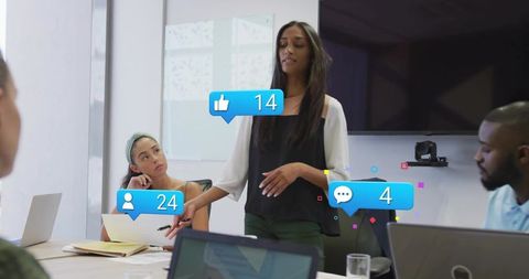 Woman leading presentation in modern boardroom with social media engagement overlays