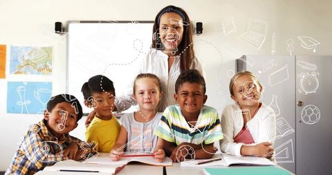 Smiling elementary teacher guiding multicultural students in bright classroom learning
