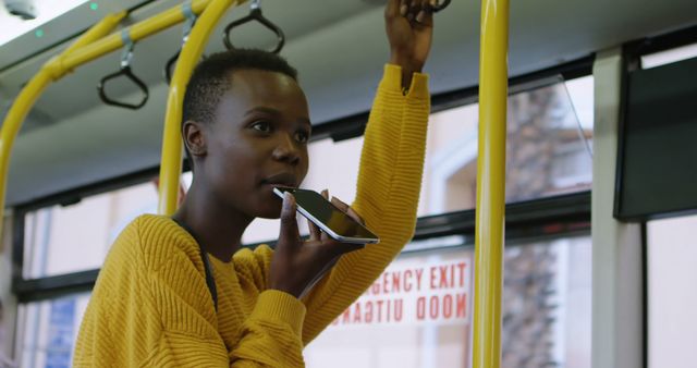 Young Woman Recording Voice Message While Commuting on Bus - Download Free Stock Images Pikwizard.com