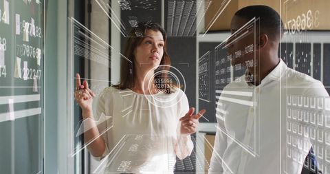 Business Professionals Interacting with Futuristic Data Interface