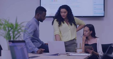 Team Collaborating on Project in Modern Work Environment