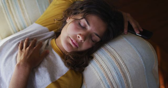 Peaceful Young Woman Sleeping on Couch - Download Free Stock Images Pikwizard.com