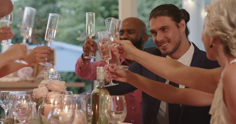 Guests Toasting at Elegant Wedding Reception