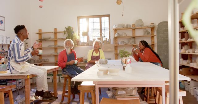 Multi-generational Family Enjoying Afternoon in Pottery Studio - Download Free Stock Images Pikwizard.com