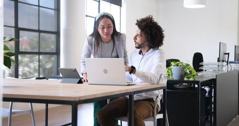 Collaborative Multiracial Teamwork in Modern Office