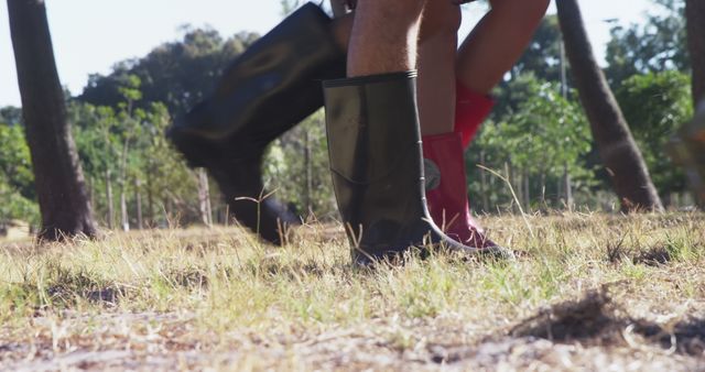 Children Wearing Rain Boots Playing Outdoors on Grassy Field - Download Free Stock Images Pikwizard.com