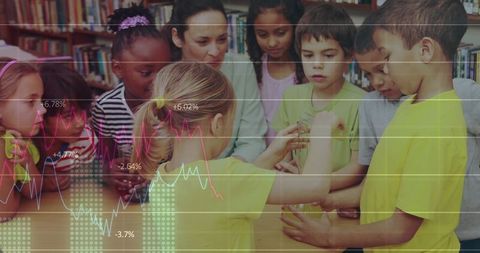 Children Exploring Science Experiment with Mentor in Library