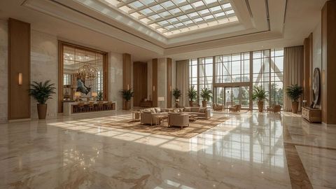 Spacious luxury hotel lobby with elegant seating area and large skylight