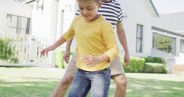 Grandfather and Grandson Playing Outside Modern Home - Download Free Stock Images Pikwizard.com