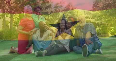 Celebrating ghanaian heritage with multi-generational family relaxing together in sunny park