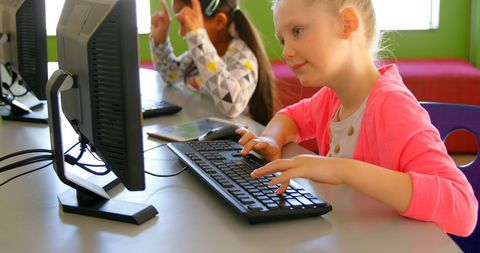 Diverse Schoolgirls Engaged in Computer Learning - Download Free Stock Images Pikwizard.com