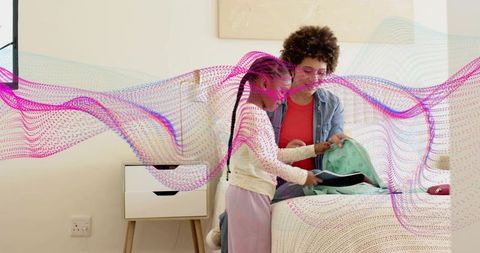 Mom in denim helping daughter pack backpack on bed, teaching morning routine at home