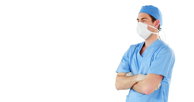 Tired Healthcare Worker in Scrubs and Mask with Arms Crossed - Download Free Stock Images Pikwizard.com