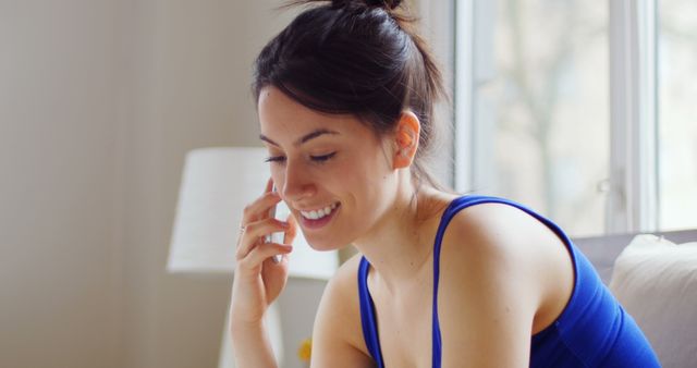 Smiling Woman Talking on Phone Relaxed at Home - Download Free Stock Images Pikwizard.com