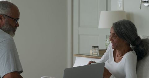 Elderly Couple Sharing Ideas at Home Together