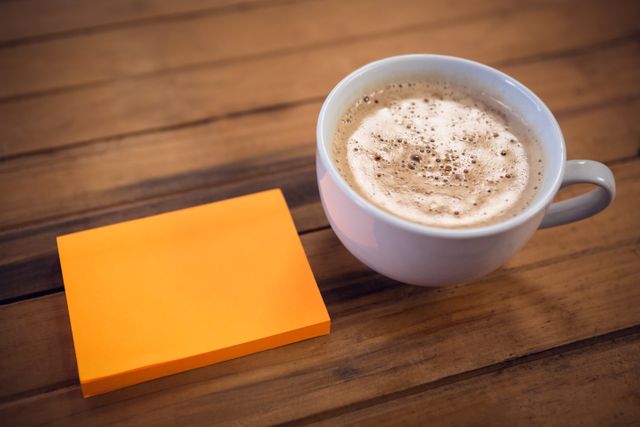 Coffee Cup and Sticky Notes on Wooden Table - Download Free Stock Photos Pikwizard.com