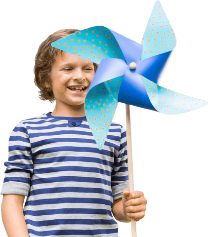 Joyful child holding large bright pinwheel outdoors transparent background