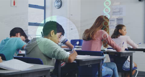 Students in Classroom Writing Exams with Data Analytics