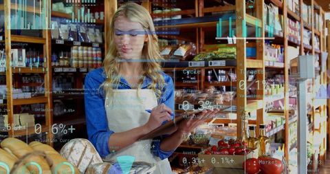 Woman grocery clerk checking inventory with clipboard and augmented data analytics overlay