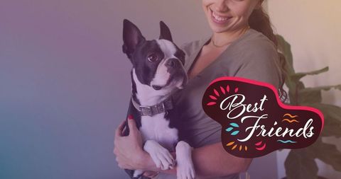 Happy Woman Embracing Cute Boston Terrier Celebrating Friendship