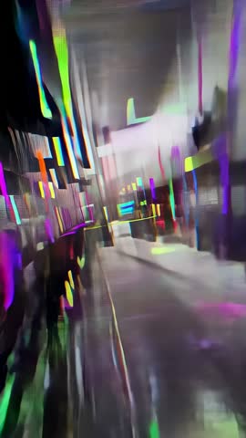 Moving POV Traveling Down Neon Corridor Showing Silhouetted Companions Walking Left