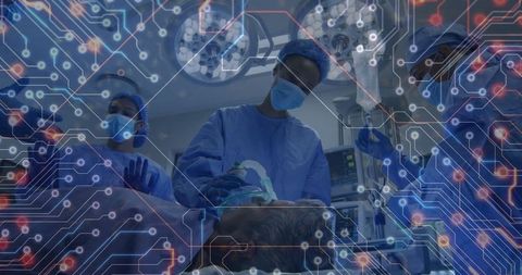 Healthcare Team Utilizing Advanced Technology During Surgery