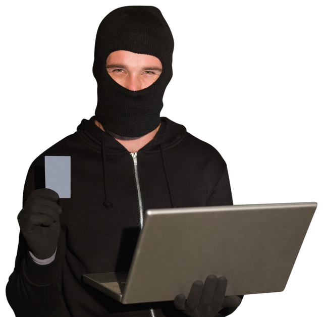 Transparent Masked Hacker Holding Laptop and Credit Card - Download Free Stock Videos Pikwizard.com