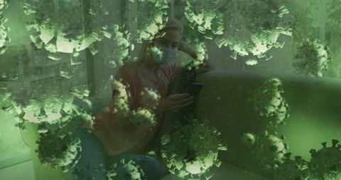 Woman with Face Mask Browsing Phone Amidst Virus Holographics