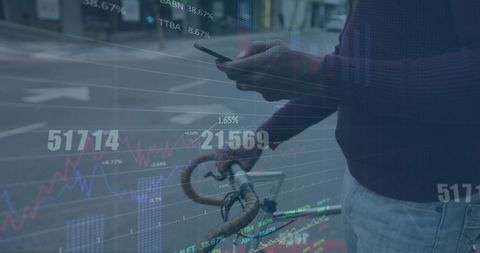 Businessman Using Smartphone Amidst Digital Financial Data