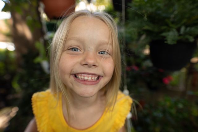 Smiling Blonde Girl Enjoying Sunny Garden - Download Free Stock Images Pikwizard.com