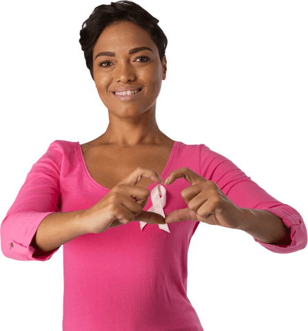 Woman in pink shirt highlighting breast cancer awareness with transparent heart gesture