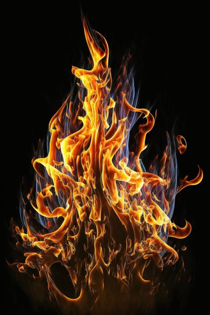 Vibrant flames creating dynamic motion on a black background. Could be used for concepts like energy, heat, power, or as a dramatic visual effect in design projects.
