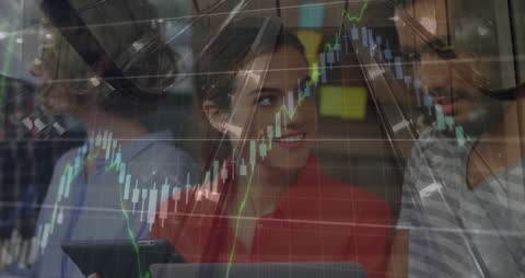 Team Collaborating on Financial Data Analysis with Technology