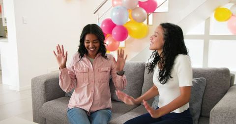 Women Relaxing at Sparkling Home Party