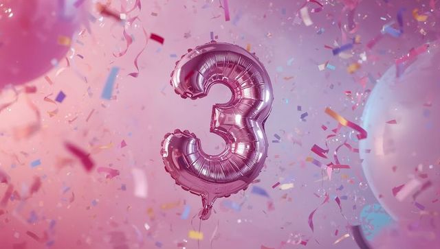 Floating rose gold number 3 balloon shimmering in confetti celebration