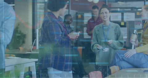 Diverse Business Team Collaborating in Office with Financial Data Overlay