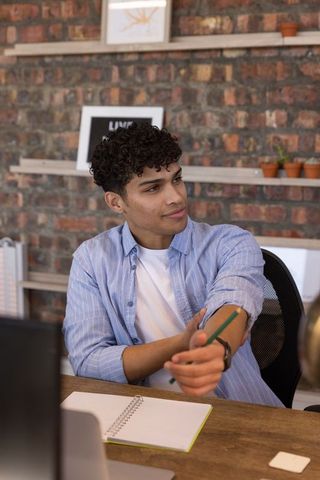 Young professional innovating in creative workspace