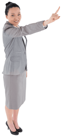 Smiling Asian Businesswoman Pointing Up on Transparent Background