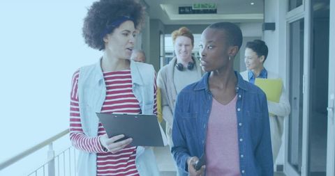 Diverse young professionals collaborating in modern workplace