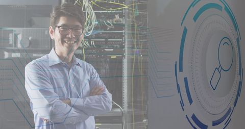Smiling Asian IT Professional in Server Room Surrounded by Data Interfaces - Download Free Stock Images Pikwizard.com