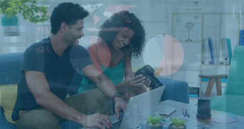 Diverse Team Collaborating in Modern Office with Technology and Photography