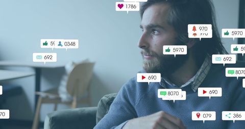 Contemplative man among social media interaction icons