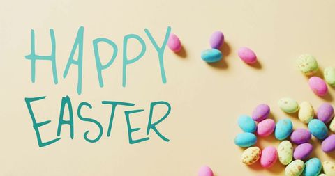 Colorful easter eggs with happy easter message on yellow background