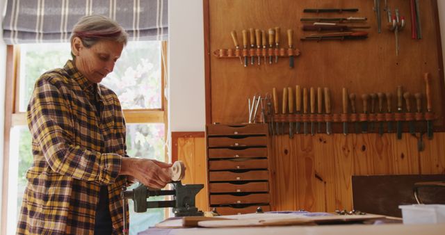 Senior Woman Working in Woodshop, Crafting Handmade Wooden Object - Download Free Stock Images Pikwizard.com