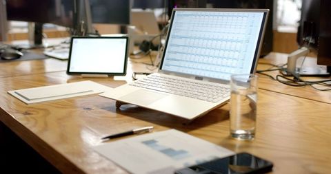 Modern Workspace with Laptop Displaying Business Data - Download Free Stock Images Pikwizard.com