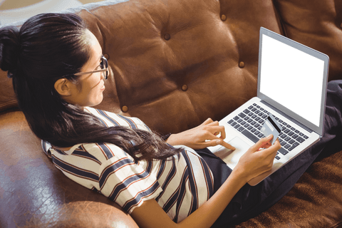woman shopping online with laptop and credit card transparent screen - Download Free Stock Videos Pikwizard.com